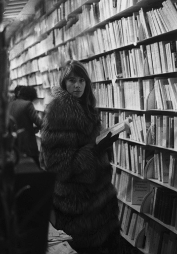 Francoise Hardy Wearing Fur Coat in Book Store