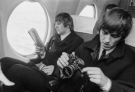 George Harrison and Ringo Starr on aeroplane
