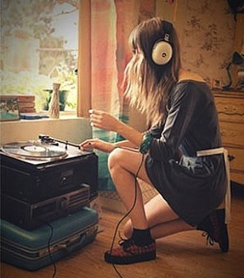 Girl Playing Records with Headphones