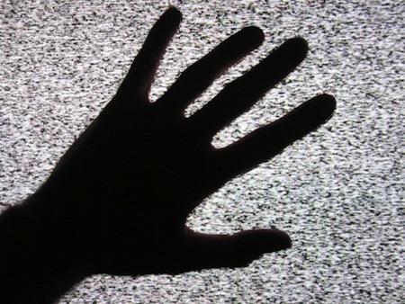 Hand In Front Of Monitor