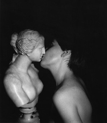 Girl Kissing Statue