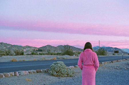 Woman in Pink Robe in the Desert